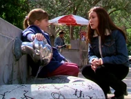 Prue asks the girl about the song