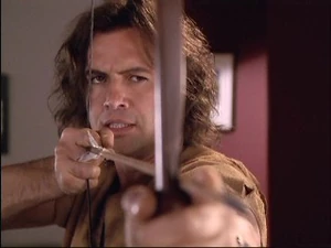 He aim his bow and arrow at slum lord