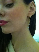 RoseTwtter.jpg (84 KB) Rose displays earrings boyfriend bought her on Twitter - June 11, 2011