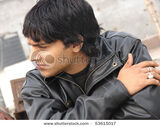 Stock-photo-portrait-of-a-young-indian-man-wearing-leather-jacket-53615017
