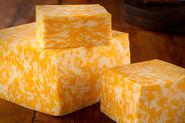 The distinctive two-tone coloration of Colby Jack cheese make it widely popular in commercially available Mexican and Italian food.