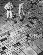 Two soldiers measure radiation levels in the 4th reactor hall.