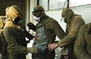 Soldiers prepare to climb onto the roof of the 4th reactor. These are ordinary army uniforms with lead tied on.