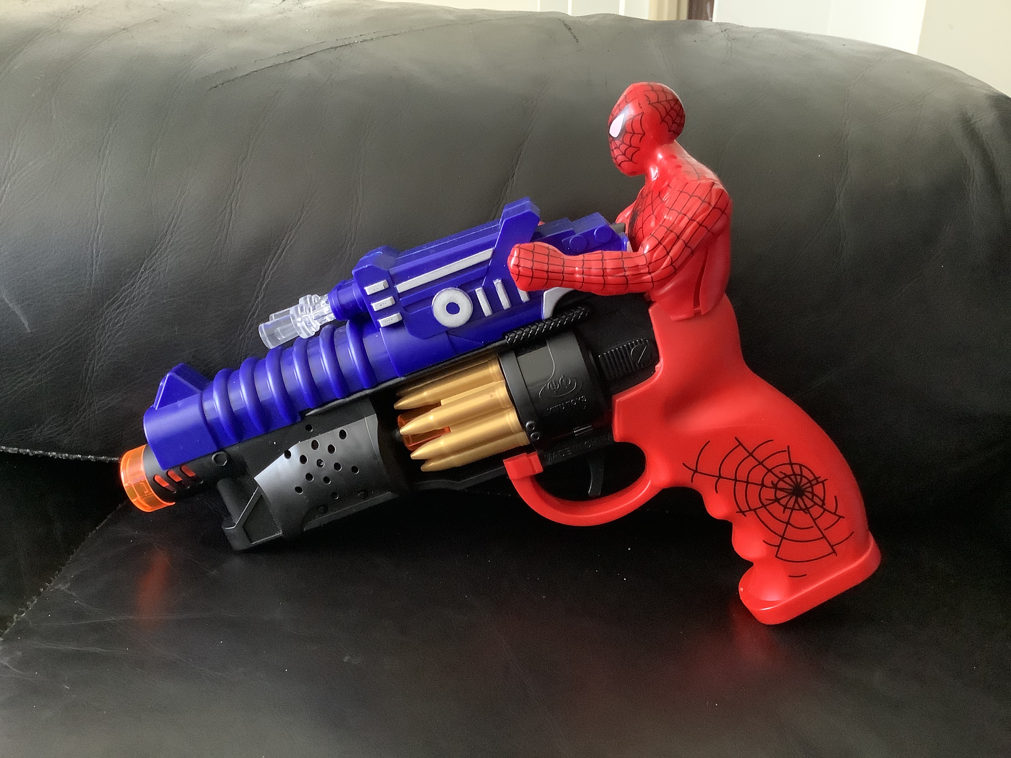 Spiderman shop gun toy