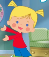 Chloe in an unused red shirt, blue pants and green shoes