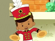 Riley as a band member (Banding Together)