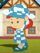 Tara in her re-decorated artist smock with a checkered tablecloth hat (Fashion Fantasy)