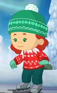 Tara in her Norwegian winter wear with ice skates (Cloudberry Cakes)