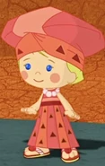 Chloe in her traditional African costume (Faster Than a Speeding Ostrich)