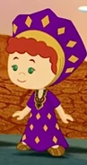 Tara in her traditional African costume (Faster Than a Speeding Ostrich)