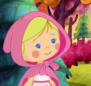 Chloe in her pink hood and dress (The Big Friendly Wolf)