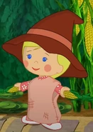 Chloe as a scarecrow (Crowing Up)