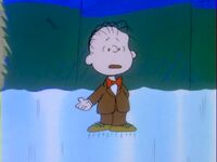 Linus about to sing "Jingle Bells".