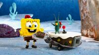 Plankton gives SpongeBob a fruitcake