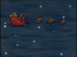 Johnny flying the sleigh