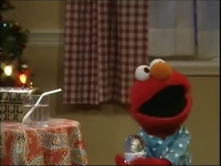 Elmo's first wish is for a glass of water because he's thirsty.