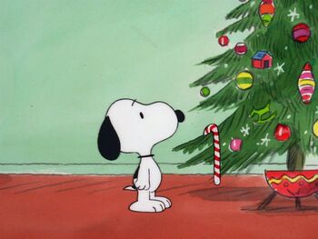 Snoopy looking at the tree