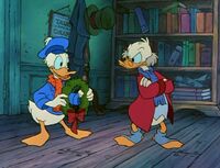 Fred (Donald) invites Scrooge to Christmas dinner.