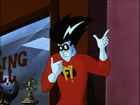Freakazoid checking pager.jpg (96 KB) Freakazoid checks his pager, but then gets distracted by...