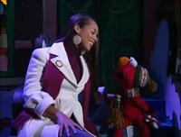 Elmo and Alicia Keys sing "Do You Hear What I Hear?".