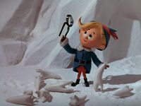 Hermey having extracted the Snowmonster's teeth.