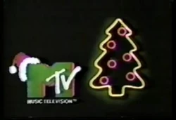 A 1990s station ID featuring the MTV logo with a Christmas tree