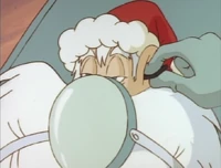 She succeeds by putting a brainwashing microchip in his ear.