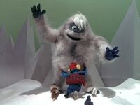 Yukon and the Abominable Snowmonster go over the cliff.