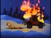 Goofy manages to save Max's present from his burning car.
