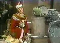 Imogene Coca appears to Oscar as the Ghost of Christmas Present in A Special Sesame Street Christmas.