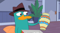 Perry with his gift from Doofenshmirtz.