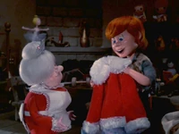 Kris gets his coat.jpg (138 KB) Tanta gives Kris his own Kringle coat.