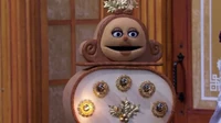 Because Sesame Street has some spirit, Holly has one light lit.