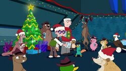 Carl gives a Secret Santa present.jpg