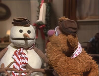 Fozzie is distressed about Statler and Waldorf heckling him and the snowman.