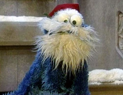 Cookie Monster disguised as Santa in Elmo Saves Christmas