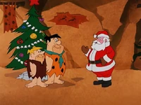 Santa congratulates Fred and Barney on how well they did.