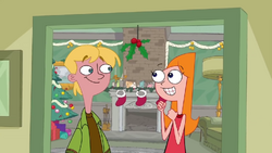 Candace and Jeremy under the mistletoe