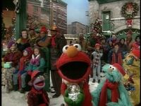 Elmo is excited that it's Christmas again.