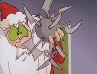 Santa, moved to tears by Jim's speech, burns out the brainwashing microchip.