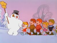 Frosty leading his friends on a parade in the original special.