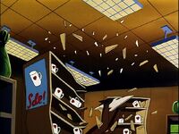 Arms crashes into mugs.jpg (151 KB) Akimbo crashes through a shelf of coffee mugs.