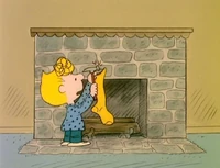 Sally hangs up her Christmas stocking in "The Play".