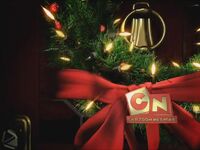 The Cartoon Network logo (used from 2004-2010) in a Christmas wreath.