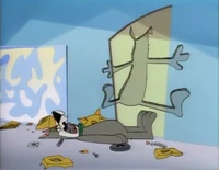 After crashing the robot cat into a wall, Astro swallows one of its gears.