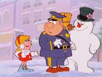 Karen tells the Traffic Cop that Frosty just came to life.