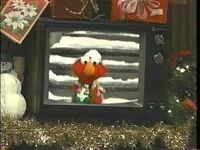 Elmo on the TV in the post-credits scene of Elmo Saves Christmas