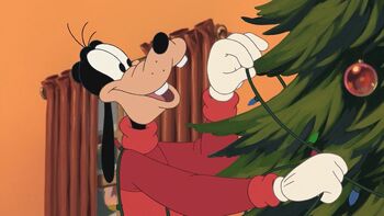 Goofy decorating his Christmas tree