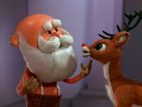 Santa asks Rudolph to guide his sleigh