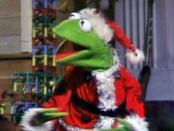 Kermit dressed as Santa